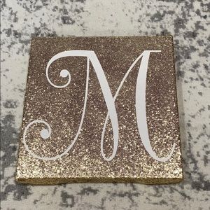glitter “m” sign for room
